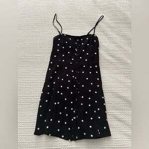 Black mini dress with white polka dots